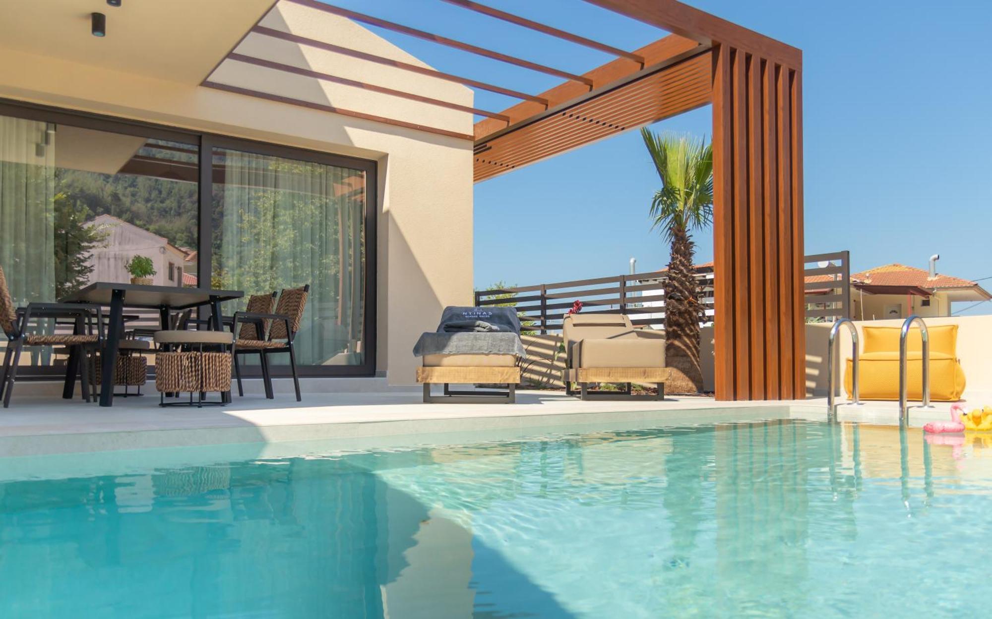 Ntinas Seaside Suites สกาลา โปเตมิอัส ภายนอก รูปภาพ